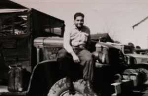 Bernard SCOTTO DI CARLO 
assis sur l'aile d'un GMC au Camp de Zarifet
